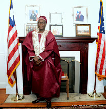 Ambassador Jeremiah C. Sulunteh, stands ready to receive guest